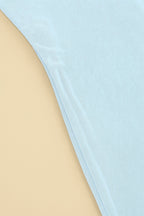 Robe Liora sirène à col montant et fleur brodée