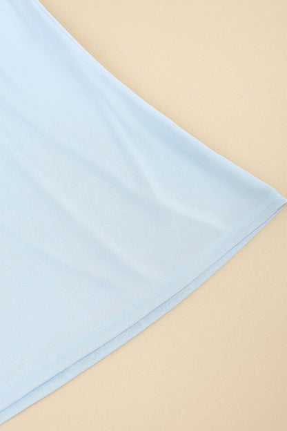 Robe Liora sirène à col montant et fleur brodée