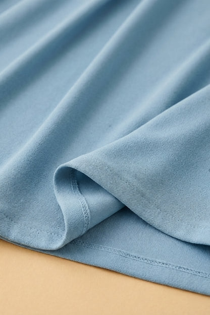 Robe Élise drapée en jersey bleu à taille haute
